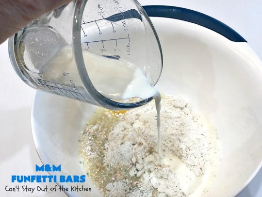 M&M Funfetti Bars | Can't Stay Out of the Kitchen | this easy 6-ingredient #recipe will knock your socks off! Every bite is so rich, decadent & divine. If you enjoy the flavors of #MMs & #Funfetti, you'll love these luscious #dessert #brownies. Great for #tailgating, potlucks or #holiday #baking. #MMFunfettiBars #ConfettiCakeMix #ChocolateDessert #cookies #MMDessert #6IngredientBrownies #chocolate