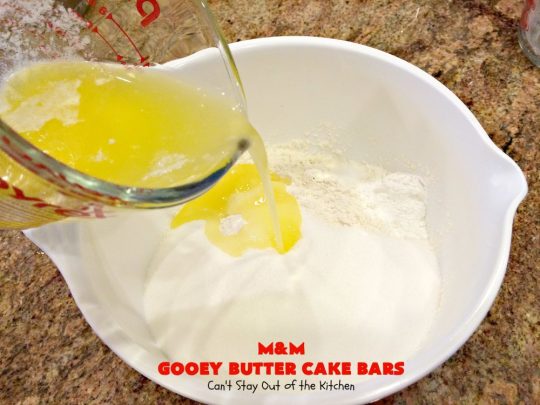 M&M Gooey Butter Cake Bars | Can't Stay Out of the Kitchen | these fabulous #Gooey ButterCake #cookies are rich and heavenly. Every bite will have you drooling. Adding #MMs is so scrumptious. Terrific #dessert for #MemorialDay or other summer #holiday fun. #brownie #chocolate #ChocolateDessert #MMDessert