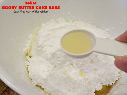 M&M Gooey Butter Cake Bars | Can't Stay Out of the Kitchen | these fabulous #Gooey ButterCake #cookies are rich and heavenly. Every bite will have you drooling. Adding #MMs is so scrumptious. Terrific #dessert for #MemorialDay or other summer #holiday fun. #brownie #chocolate #ChocolateDessert #MMDessert