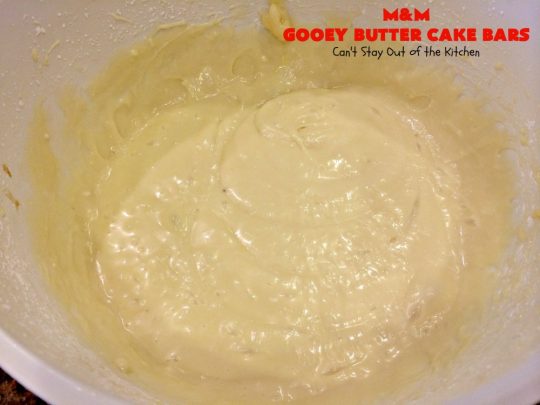 M&M Gooey Butter Cake Bars | Can't Stay Out of the Kitchen | these fabulous #Gooey ButterCake #cookies are rich and heavenly. Every bite will have you drooling. Adding #MMs is so scrumptious. Terrific #dessert for #MemorialDay or other summer #holiday fun. #brownie #chocolate #ChocolateDessert #MMDessert