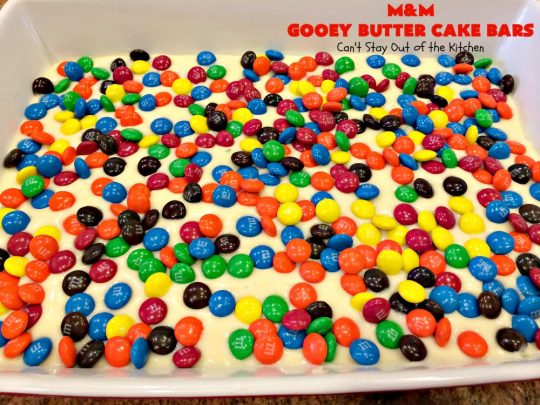 M&M Gooey Butter Cake Bars | Can't Stay Out of the Kitchen | these fabulous #Gooey ButterCake #cookies are rich and heavenly. Every bite will have you drooling. Adding #MMs is so scrumptious. Terrific #dessert for #MemorialDay or other summer #holiday fun. #brownie #chocolate #ChocolateDessert #MMDessert