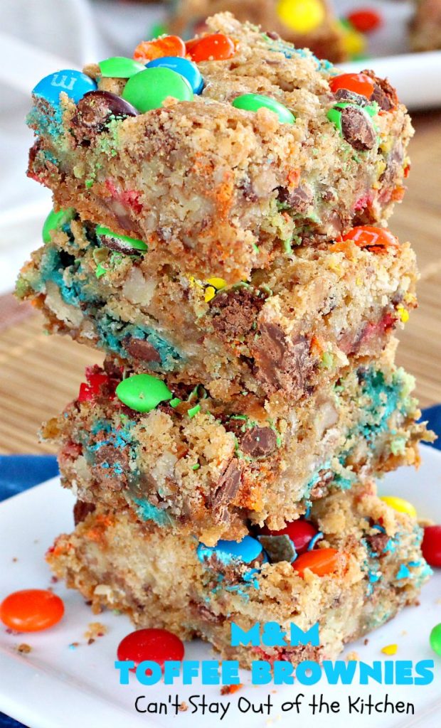 M&M Toffee Brownies | Can't Stay Out of the Kitchen | these #brownies are nothing short of sensational! They're filled with #MMs, #coconut, #pecans & #HeathEnglishToffeeBits. Terrific for #tailgating parties, potlucks, backyard BBQs & summer #holiday fun like #FourthOfJuly. #MMDessert #chocolate #HolidayDessert #ToffeeDessert #toffee #ChocolateDessert