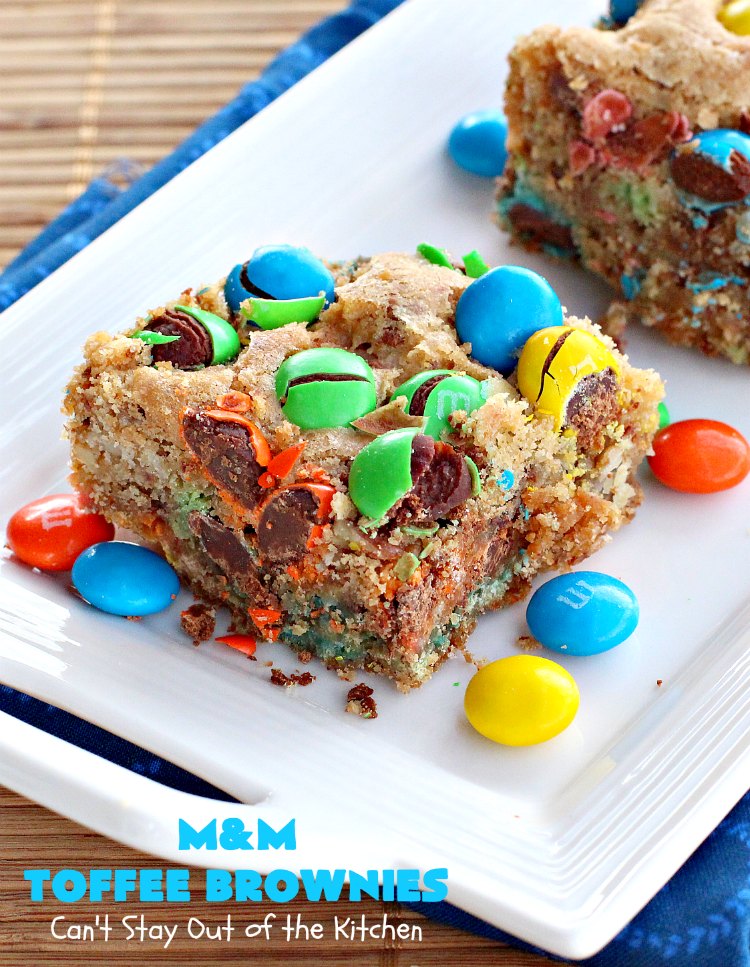 M&M Toffee Brownies | Can't Stay Out of the Kitchen | these #brownies are nothing short of sensational! They're filled with #MMs, #coconut, #pecans & #HeathEnglishToffeeBits. Terrific for #tailgating parties, potlucks, backyard BBQs & summer #holiday fun like #FourthOfJuly. #MMDessert #chocolate #HolidayDessert #ToffeeDessert #toffee #ChocolateDessert