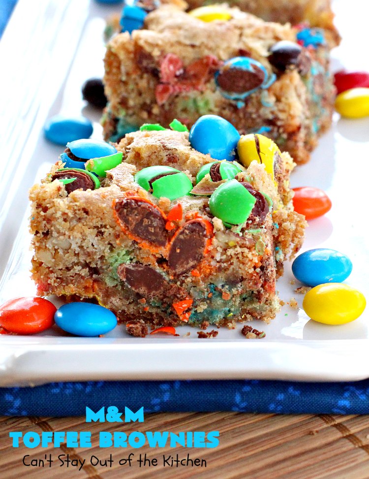M&M Toffee Brownies | Can't Stay Out of the Kitchen | these #brownies are nothing short of sensational! They're filled with #MMs, #coconut, #pecans & #HeathEnglishToffeeBits. Terrific for #tailgating parties, potlucks, backyard BBQs & summer #holiday fun like #FourthOfJuly. #MMDessert #chocolate #HolidayDessert #ToffeeDessert #toffee #ChocolateDessert