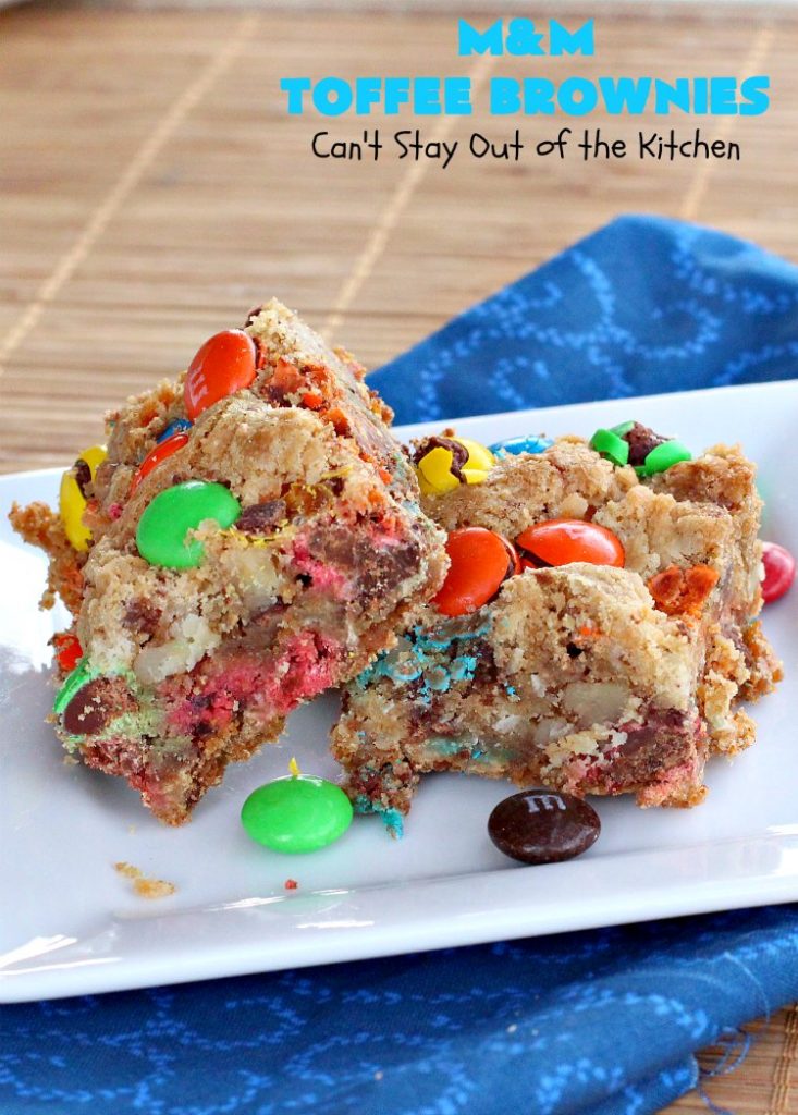 M&M Toffee Brownies | Can't Stay Out of the Kitchen | these #brownies are nothing short of sensational! They're filled with #MMs, #coconut, #pecans & #HeathEnglishToffeeBits. Terrific for #tailgating parties, potlucks, backyard BBQs & summer #holiday fun like #FourthOfJuly. #MMDessert #chocolate #HolidayDessert #ToffeeDessert #toffee #ChocolateDessert