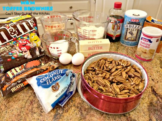 M&M Toffee Brownies | Can't Stay Out of the Kitchen | these #brownies are nothing short of sensational! They're filled with #MMs, #coconut, #pecans & #HeathEnglishToffeeBits. Terrific for #tailgating parties, potlucks, backyard BBQs & summer #holiday fun like #FourthOfJuly. #MMDessert #chocolate #HolidayDessert #ToffeeDessert #toffee #ChocolateDessert