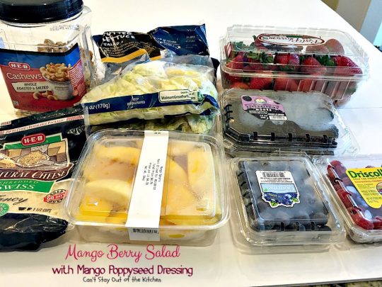 Mango Berry Salad with Mango Poppyseed Dressing | Can't Stay Out of the Kitchen | this amazing #salad has double the #mango flavor. Filled with #strawberries #raspberries #blueberries #blackberries & #swisscheese. We love this #salad. #glutenfree #cleaneating