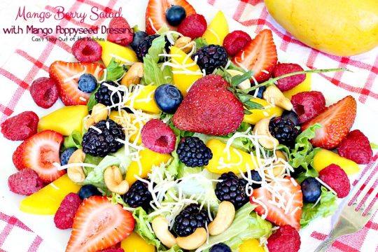 Mango Berry Salad with Mango Poppyseed Dressing | Can't Stay Out of the Kitchen | this amazing #salad has double the #mango flavor. Filled with #strawberries #raspberries #blueberries #blackberries & #swisscheese. We love this #salad. #glutenfree #cleaneating
