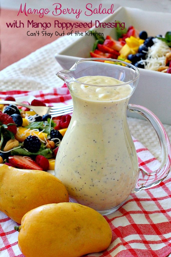 Mango Berry Salad with Mango Poppyseed Dressing | Can't Stay Out of the Kitchen | this amazing #salad has double the #mango flavor. Filled with #strawberries #raspberries #blueberries #blackberries & #swisscheese. We love this #salad. #glutenfree #cleaneating