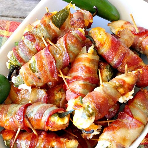 Maple Bacon Stuffed Jalapenos | Can't Stay Out of the Kitchen | this spectacular #appetizer is a 6 ingredient #recipe. #Bacon wrapped #jalapenos are stuffed with #creamcheese & #cheddarcheese & drizzled with #maplesyrup after baking. Our company loved them! They're perfect for any #holiday party or potluck. #appetizer #glutenfree #tailgating