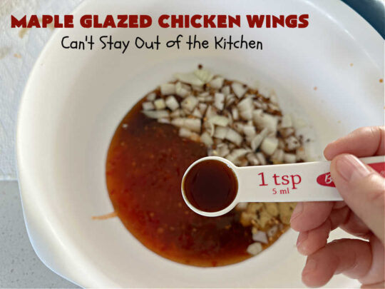 Maple Glazed Chicken Wings | Can't Stay Out of the Kitchen | Prepare to lick your chops after one bite of these amazing #ChickenWings. They're made with #ChiliSauce & #MapleSyrup & #grill up wonderfully for #tailgating parties, #potlucks or even family dinner. Great as an #appetizer especially when served with a #HoneyMustardSauce. #chicken #poultry #GlutenFree #MapleGlazedChickenWings