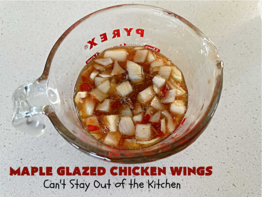 Maple Glazed Chicken Wings | Can't Stay Out of the Kitchen | Prepare to lick your chops after one bite of these amazing #ChickenWings. They're made with #ChiliSauce & #MapleSyrup & #grill up wonderfully for #tailgating parties, #potlucks or even family dinner. Great as an #appetizer especially when served with a #HoneyMustardSauce. #chicken #poultry #GlutenFree #MapleGlazedChickenWings