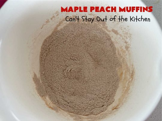 Maple Peach Muffins | Can't Stay Out of the Kitchen | Indulge your sweet tooth by making a batch of these sensational #muffins for your next weekend, company or #holiday #breakfast or #brunch. These include both #MapleSyrup & #MapleExtract for a bump in flavor. #Peaches & a #StreuselTopping that includes #pecans makes them especially good. #MaplePeachMuffins