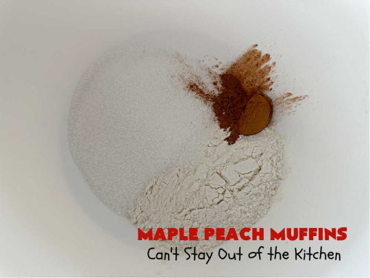 Maple Peach Muffins | Can't Stay Out of the Kitchen | Indulge your sweet tooth by making a batch of these sensational #muffins for your next weekend, company or #holiday #breakfast or #brunch. These include both #MapleSyrup & #MapleExtract for a bump in flavor. #Peaches & a #StreuselTopping that includes #pecans makes them especially good. #MaplePeachMuffins