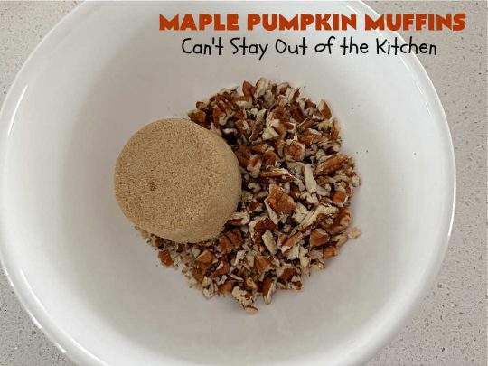 Maple Pumpkin Muffins | Can't Stay Out of the Kitchen | these fantastic #muffins include a #cheesecake layer swirled through the batter! They're topped with a lovely #streusel topping that adds a delightful crunch. Tasty treat for a weekend, company or #holiday #breakfast or #brunch. #pecans #MapleSyrup #pumpkin #CreamCheese #PumpkinMuffins #FallBaking #MaplePumpkinMuffins
