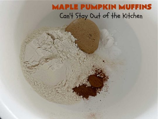 Maple Pumpkin Muffins | Can't Stay Out of the Kitchen | these fantastic #muffins include a #cheesecake layer swirled through the batter! They're topped with a lovely #streusel topping that adds a delightful crunch. Tasty treat for a weekend, company or #holiday #breakfast or #brunch. #pecans #MapleSyrup #pumpkin #CreamCheese #PumpkinMuffins #FallBaking #MaplePumpkinMuffins