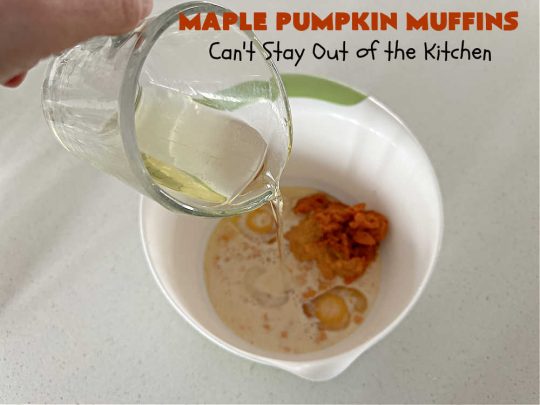 Maple Pumpkin Muffins | Can't Stay Out of the Kitchen | these fantastic #muffins include a #cheesecake layer swirled through the batter! They're topped with a lovely #streusel topping that adds a delightful crunch. Tasty treat for a weekend, company or #holiday #breakfast or #brunch. #pecans #MapleSyrup #pumpkin #CreamCheese #PumpkinMuffins #FallBaking #MaplePumpkinMuffins