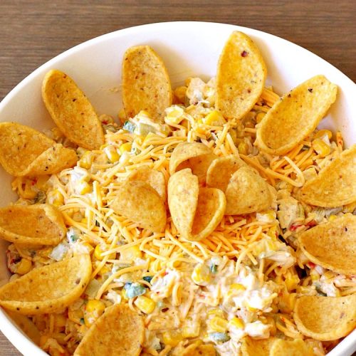 Mexican Corn Dip | Can't Stay Out of the Kitchen | this fantastic #TexMex #appetizer is phenomenal. It includes #SouthwesternCorn, #JalapenoPeppers, #GreenChilies & #CheddarCheese. Only 6 ingredients & so easy for any #tailgating party, potluck or grilling out with friends. #corn #CincoDeMayo #GlutenFree #MexicanCornDip #SuperBowl