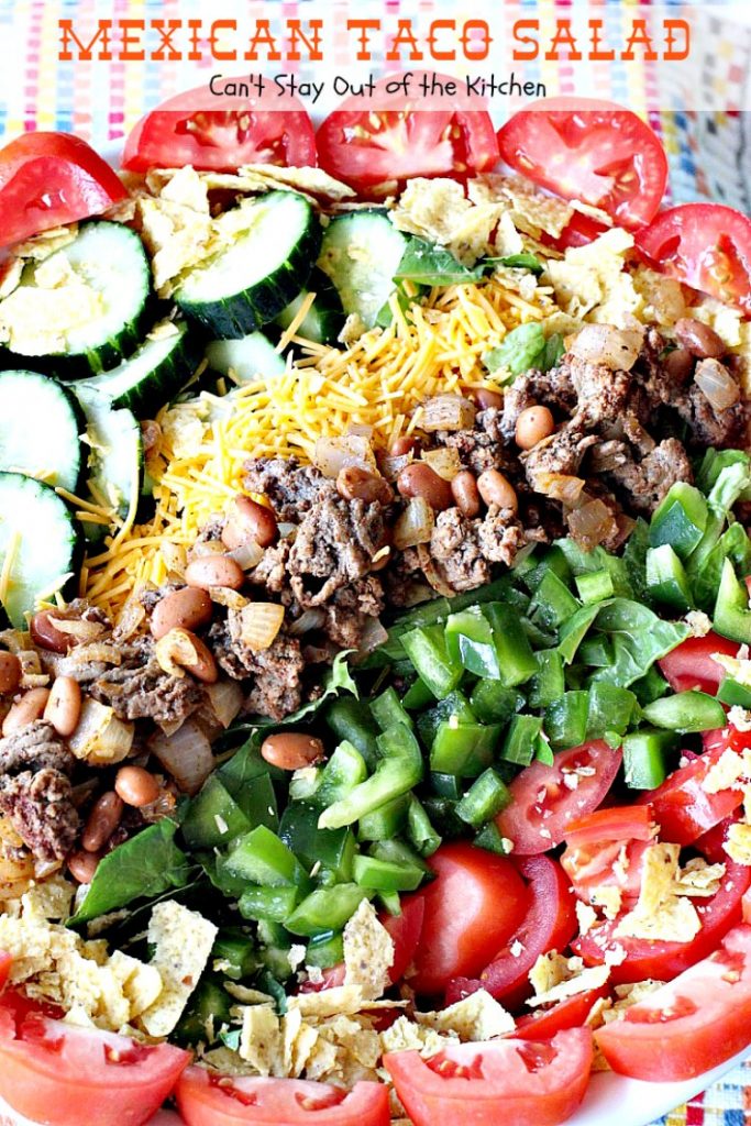 Mexican Taco Salad | Can't Stay Out of the Kitchen | dynamite #TexMex #salad with spicy #groundbeef, #pintobeans, #cheese & tortilla chips. Great for summer potlucks. #glutenfree