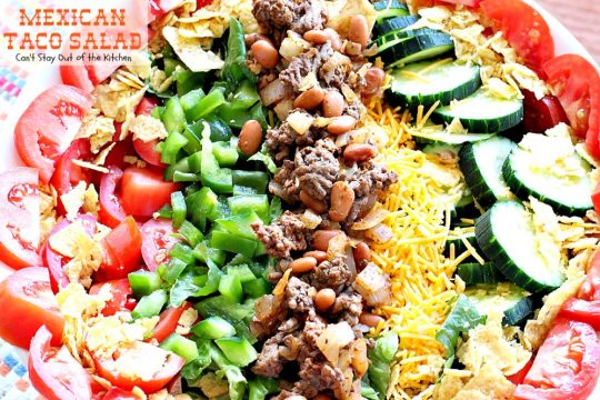 Mexican Taco Salad | Can't Stay Out of the Kitchen | dynamite #TexMex #salad with spicy #groundbeef, #pintobeans, #cheese & tortilla chips. Great for summer potlucks. #glutenfree