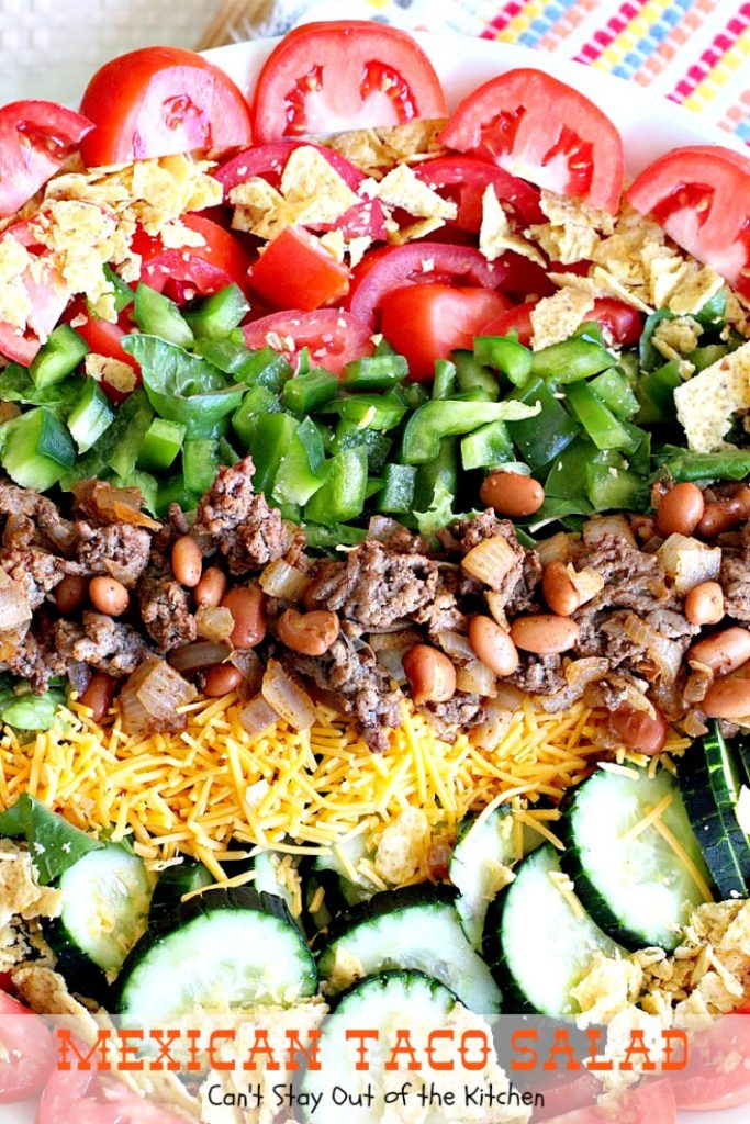 Mexican Taco Salad | Can't Stay Out of the Kitchen | dynamite #TexMex #salad with spicy #groundbeef, #pintobeans, #cheese & tortilla chips. Great for summer potlucks. #glutenfree