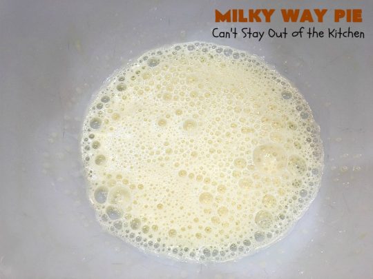 Milky Way Pie | Can't Stay Out of the Kitchen | this #pie will rock your world! It's filled with #MilkyWayBars so it gives you a spectacular dose of #chocolate & #caramel. Each bite will cure whatever ails ya! Great for special occasions, #holidays & #ValentinesDay. #dessert #HolidayDessert #ChocolateDessert #CaramelDessert #MilkyWayPie