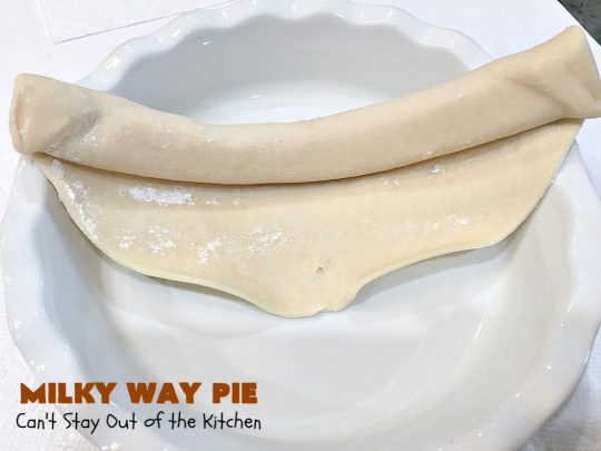 Milky Way Pie | Can't Stay Out of the Kitchen | this #pie will rock your world! It's filled with #MilkyWayBars so it gives you a spectacular dose of #chocolate & #caramel. Each bite will cure whatever ails ya! Great for special occasions, #holidays & #ValentinesDay. #dessert #HolidayDessert #ChocolateDessert #CaramelDessert #MilkyWayPie