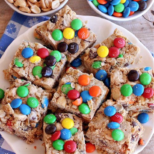 Monster Brownies | Can't Stay Out of the Kitchen | These #brownies are loaded with #MMs, #peanuts, #ChocolateChips & white #chocolate chips. They're terrific for #holidays, #tailgating parties or potlucks or anytime you need a chocolate fix! Every bite will rock your world! #oatmeal #cookies #holiday #HolidayDessert #ChristmasCookieExchange #PeanutButter #PPeanutButterDessert #ChocolateDessert #HolidayBaking #MonsterBrownies