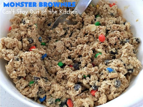 Monster Brownies | Can't Stay Out of the Kitchen | These #brownies are loaded with #MMs, #peanuts, #ChocolateChips & white #chocolate chips. They're terrific for #holidays, #tailgating parties or potlucks or anytime you need a chocolate fix! Every bite will rock your world! #oatmeal #cookies #holiday #HolidayDessert #ChristmasCookieExchange #PeanutButter #PPeanutButterDessert #ChocolateDessert #HolidayBaking #MonsterBrownies