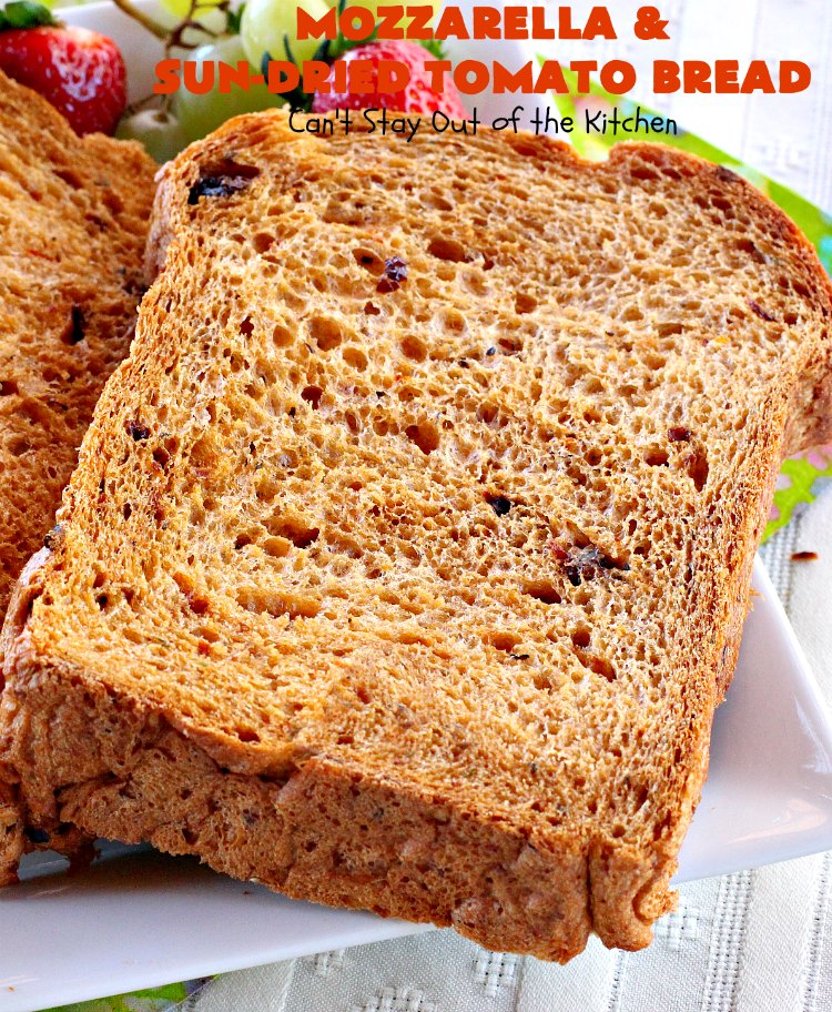 Mozzarella and Sun-Dried Tomato Bread | Can't Stay Out of the Kitchen | this fantastic #bread is so quick & easy since it's made in the #breadmaker. The savory flavors of #MozzarellaCheese, #SunDriedTomatoes, basil & oregano really come through making this one spectacularly tasting #HomeBakedBread. Wonderful as a side dish for any entree. #Italian #MozzarellaAndSunDriedTomatoBread