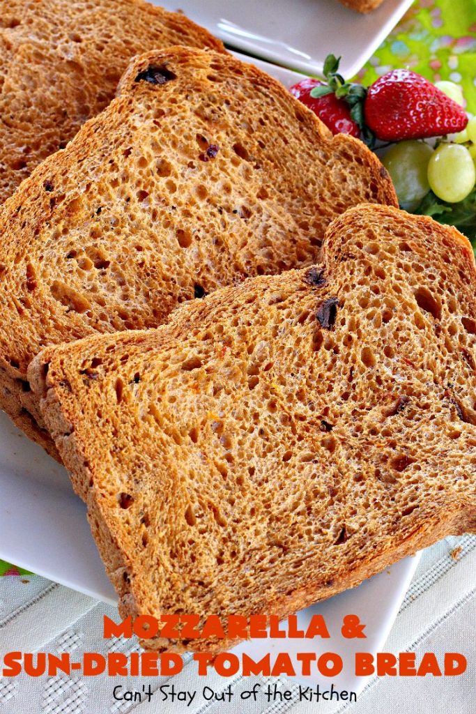 Mozzarella and Sun-Dried Tomato Bread | Can't Stay Out of the Kitchen | this fantastic #bread is so quick & easy since it's made in the #breadmaker. The savory flavors of #MozzarellaCheese, #SunDriedTomatoes, basil & oregano really come through making this one spectacularly tasting #HomeBakedBread. Wonderful as a side dish for any entree. #Italian #MozzarellaAndSunDriedTomatoBread