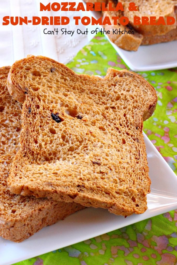 Mozzarella and Sun-Dried Tomato Bread | Can't Stay Out of the Kitchen | this fantastic #bread is so quick & easy since it's made in the #breadmaker. The savory flavors of #MozzarellaCheese, #SunDriedTomatoes, basil & oregano really come through making this one spectacularly tasting #HomeBakedBread. Wonderful as a side dish for any entree. #Italian #MozzarellaAndSunDriedTomatoBread