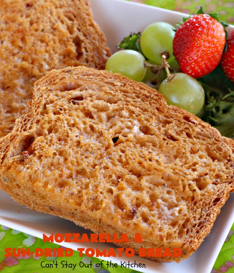 Mozzarella and Sun-Dried Tomato Bread | Can't Stay Out of the Kitchen | this fantastic #bread is so quick & easy since it's made in the #breadmaker. The savory flavors of #MozzarellaCheese, #SunDriedTomatoes, basil & oregano really come through making this one spectacularly tasting #HomeBakedBread. Wonderful as a side dish for any entree. #Italian #MozzarellaAndSunDriedTomatoBread