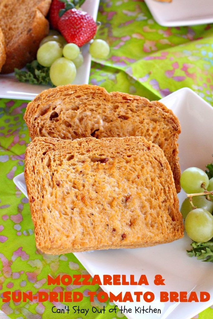Mozzarella and Sun-Dried Tomato Bread | Can't Stay Out of the Kitchen | this fantastic #bread is so quick & easy since it's made in the #breadmaker. The savory flavors of #MozzarellaCheese, #SunDriedTomatoes, basil & oregano really come through making this one spectacularly tasting #HomeBakedBread. Wonderful as a side dish for any entree. #Italian #MozzarellaAndSunDriedTomatoBread