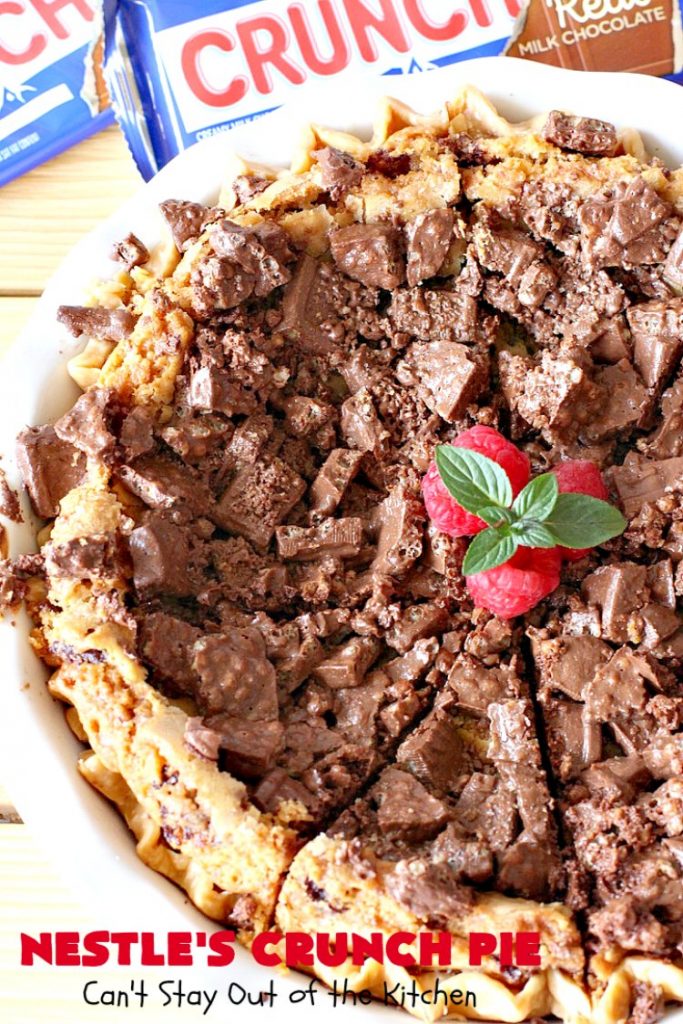 Nestle's Crunch Pie | Can't Stay Out of the Kitchen | this spectacular #pie is filled with #NestlesCrunchBars! It has that smooth milk #chocolate taste with a little crunch added to make it special. Every bite is a chocolaty delight. Terrific for company, #holidays like #ValentinesDay or special occasions. #Nestles #dessert #HolidayDessert #ChocolateDessert #NestlesCrunchPie