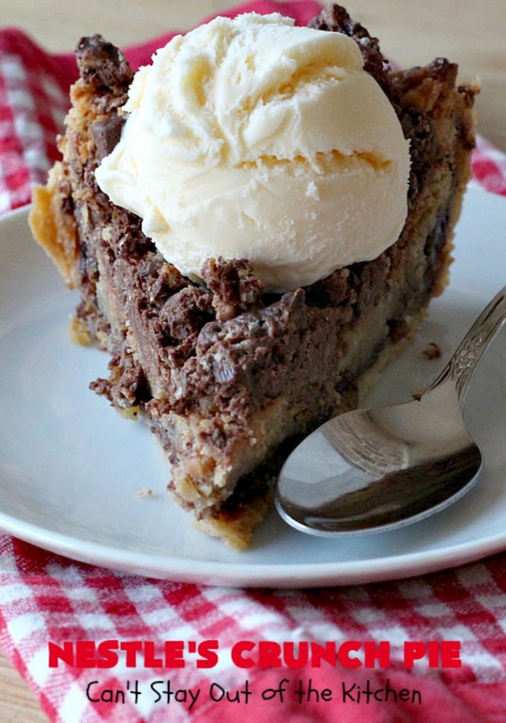 Nestle's Crunch Pie | Can't Stay Out of the Kitchen | this spectacular #pie is filled with #NestlesCrunchBars! It has that smooth milk #chocolate taste with a little crunch added to make it special. Every bite is a chocolaty delight. Terrific for company, #holidays like #ValentinesDay or special occasions. #Nestles #dessert #HolidayDessert #ChocolateDessert #NestlesCrunchPie