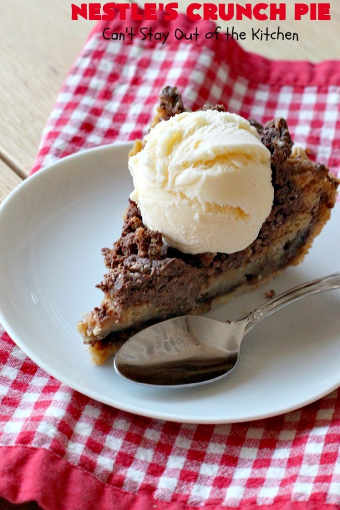 Nestle's Crunch Pie | Can't Stay Out of the Kitchen | this spectacular #pie is filled with #NestlesCrunchBars! It has that smooth milk #chocolate taste with a little crunch added to make it special. Every bite is a chocolaty delight. Terrific for company, #holidays like #ValentinesDay or special occasions. #Nestles #dessert #HolidayDessert #ChocolateDessert #NestlesCrunchPie