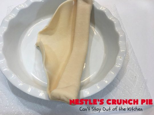 Nestle's Crunch Pie | Can't Stay Out of the Kitchen | this spectacular #pie is filled with #NestlesCrunchBars! It has that smooth milk #chocolate taste with a little crunch added to make it special. Every bite is a chocolaty delight. Terrific for company, #holidays like #ValentinesDay or special occasions. #Nestles #dessert #HolidayDessert #ChocolateDessert #NestlesCrunchPie