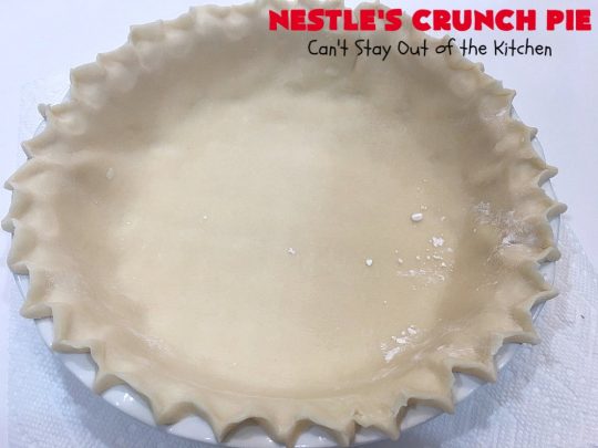 Nestle's Crunch Pie | Can't Stay Out of the Kitchen | this spectacular #pie is filled with #NestlesCrunchBars! It has that smooth milk #chocolate taste with a little crunch added to make it special. Every bite is a chocolaty delight. Terrific for company, #holidays like #ValentinesDay or special occasions. #Nestles #dessert #HolidayDessert #ChocolateDessert #NestlesCrunchPie