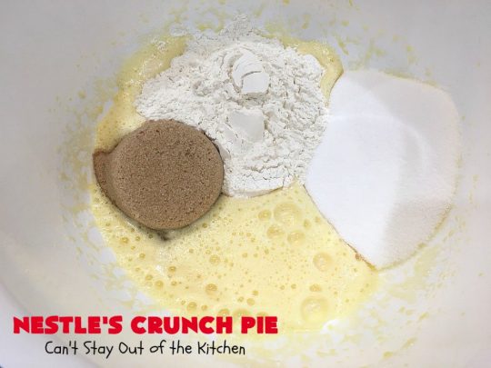 Nestle's Crunch Pie | Can't Stay Out of the Kitchen | this spectacular #pie is filled with #NestlesCrunchBars! It has that smooth milk #chocolate taste with a little crunch added to make it special. Every bite is a chocolaty delight. Terrific for company, #holidays like #ValentinesDay or special occasions. #Nestles #dessert #HolidayDessert #ChocolateDessert #NestlesCrunchPie