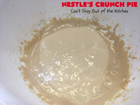 Nestle's Crunch Pie | Can't Stay Out of the Kitchen | this spectacular #pie is filled with #NestlesCrunchBars! It has that smooth milk #chocolate taste with a little crunch added to make it special. Every bite is a chocolaty delight. Terrific for company, #holidays like #ValentinesDay or special occasions. #Nestles #dessert #HolidayDessert #ChocolateDessert #NestlesCrunchPie