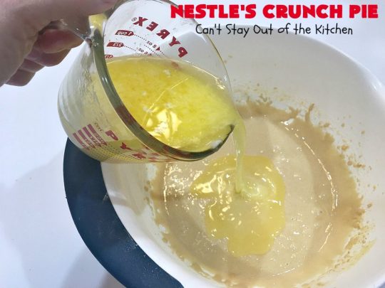 Nestle's Crunch Pie | Can't Stay Out of the Kitchen | this spectacular #pie is filled with #NestlesCrunchBars! It has that smooth milk #chocolate taste with a little crunch added to make it special. Every bite is a chocolaty delight. Terrific for company, #holidays like #ValentinesDay or special occasions. #Nestles #dessert #HolidayDessert #ChocolateDessert #NestlesCrunchPie