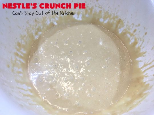Nestle's Crunch Pie | Can't Stay Out of the Kitchen | this spectacular #pie is filled with #NestlesCrunchBars! It has that smooth milk #chocolate taste with a little crunch added to make it special. Every bite is a chocolaty delight. Terrific for company, #holidays like #ValentinesDay or special occasions. #Nestles #dessert #HolidayDessert #ChocolateDessert #NestlesCrunchPie