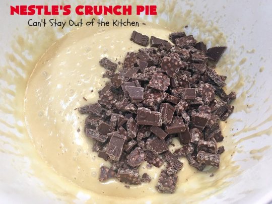 Nestle's Crunch Pie | Can't Stay Out of the Kitchen | this spectacular #pie is filled with #NestlesCrunchBars! It has that smooth milk #chocolate taste with a little crunch added to make it special. Every bite is a chocolaty delight. Terrific for company, #holidays like #ValentinesDay or special occasions. #Nestles #dessert #HolidayDessert #ChocolateDessert #NestlesCrunchPie