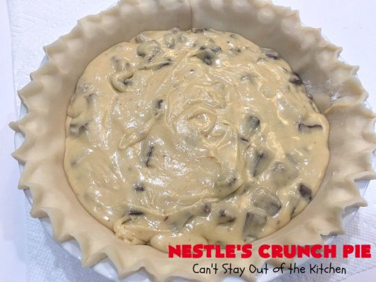Nestle's Crunch Pie | Can't Stay Out of the Kitchen | this spectacular #pie is filled with #NestlesCrunchBars! It has that smooth milk #chocolate taste with a little crunch added to make it special. Every bite is a chocolaty delight. Terrific for company, #holidays like #ValentinesDay or special occasions. #Nestles #dessert #HolidayDessert #ChocolateDessert #NestlesCrunchPie