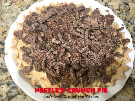 Nestle's Crunch Pie | Can't Stay Out of the Kitchen | this spectacular #pie is filled with #NestlesCrunchBars! It has that smooth milk #chocolate taste with a little crunch added to make it special. Every bite is a chocolaty delight. Terrific for company, #holidays like #ValentinesDay or special occasions. #Nestles #dessert #HolidayDessert #ChocolateDessert #NestlesCrunchPie