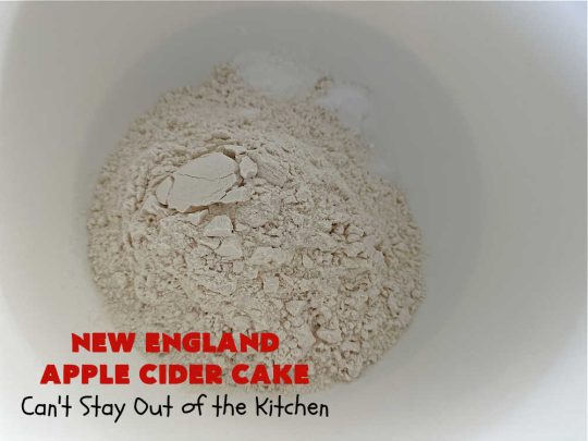New England Apple Cider Cake | Can't Stay Out of the Kitchen | This lovely #AppleCake features #AppleCider which is boiled down to a syrup and used to flavor both the #cake & the #frosting. It's a dreamy, nut-free #NewEngland-style concoction that will have you swooning. If you enjoy #vintage down-home #recipes, this #AppleCiderCake is for you! #apples #cinnamon #holiday #FallBaking #NewEnglandAppleCiderCake