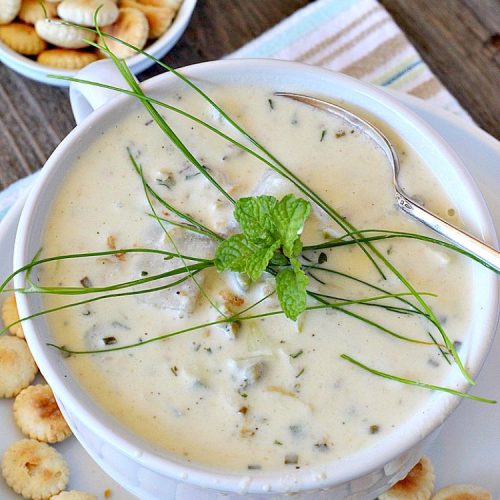 New England Clam Chowder | Can't Stay Out of the Kitchen | this is the BEST #clamchowder #recipe ever! It's filled with minced #clams, leeks, #redpotatoes & seasoned wonderfully with chives, parsley & #OldBaySeasoning. It's marvelous comfort food for #fall. We always serve it with #OysterCrackers. #glutenfree #soup #NewEnglandClamChowder #glutenfreesoup