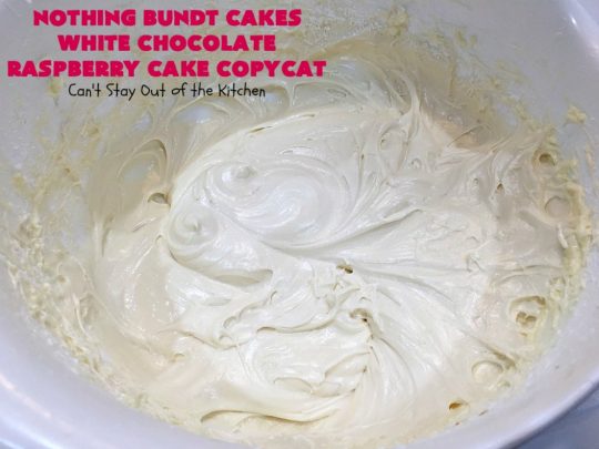 Nothing Bundt Cakes White Chocolate Raspberry Cake Copycat | Can't Stay Out of the Kitchen | this spectacular #CopycatRecipe will rock your world! #WhiteChocolate & #RaspberryPieFilling combined with #CreamCheese frosting make this a #dessert you won't be able to resist! #NothingBundtCakes #cake #holiday #ChocolateDessert #RaspberryDessert #HolidayDessert #NothingBundtCakesWhiteChocolateRaspberryCakeCopycat #recipe #copycat