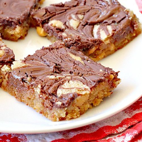 Nutella Peanut Butter Swirl Bars | Can't Stay Out of the Kitchen | these fantastic #brownies use a #peanutbutter #cookie dough with #Nutella swirled into the batter. This #dessert is heavenly! #tailgating